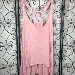 Blush colored, flowy tank top with lace detailing